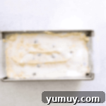 lemon blueberry pound cake batter in a tin.