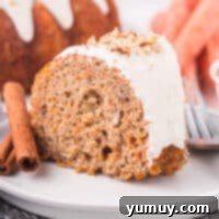A beautiful featured image of a carrot bundt cake, highlighting its golden-brown crust and moist interior.
