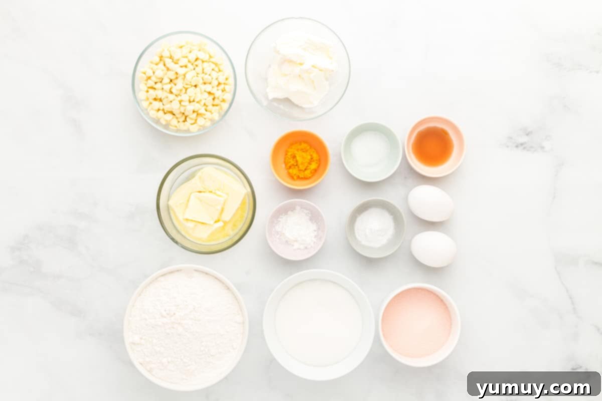 overhead view of ingredients for orange creamsicle cookies in individual bowls.