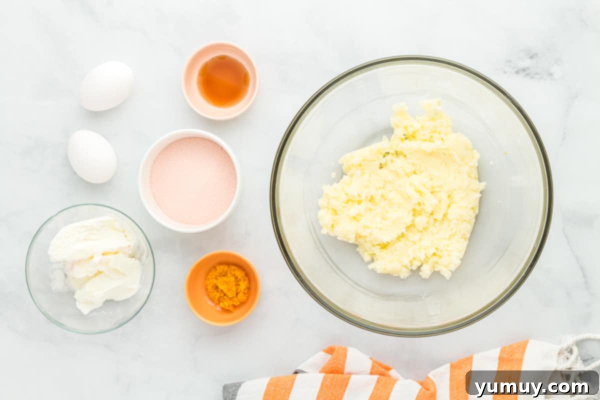 overhead view of creamed butter and sugar in a glass bowl.