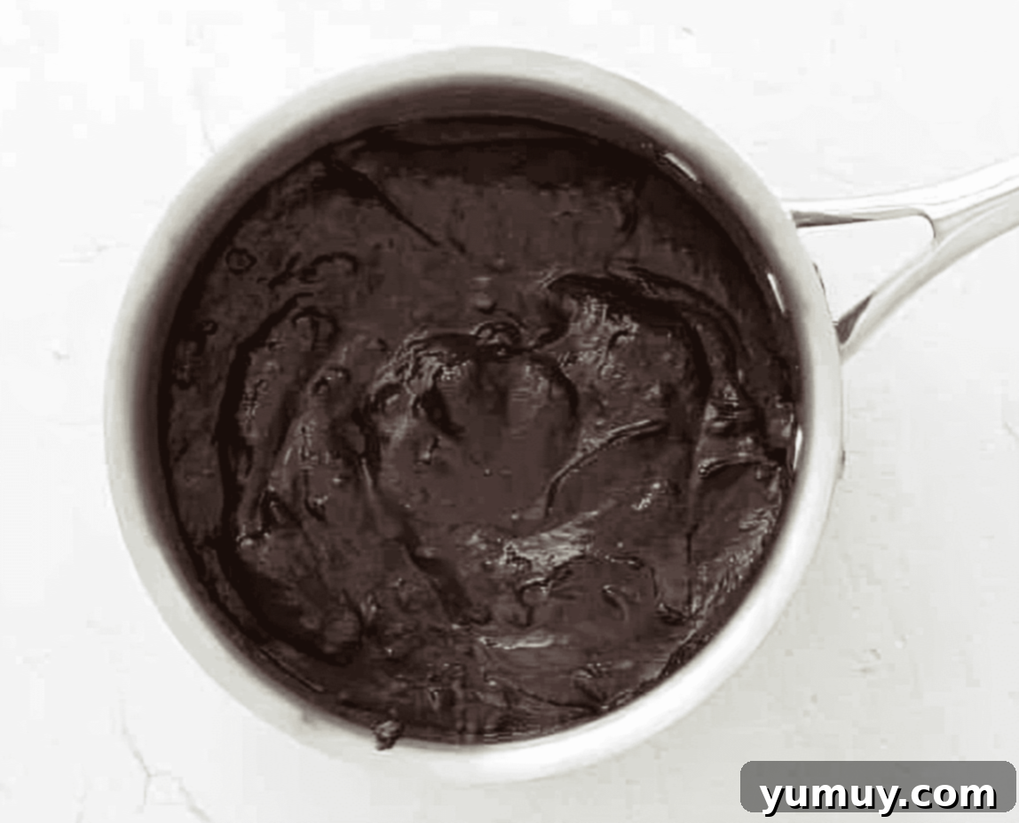 Layered S'mores Delight 11 chocolate pudding in a saucepan.