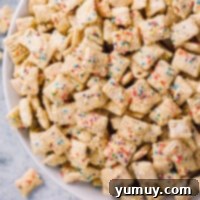 A featured image of the delightful Birthday Cake Puppy Chow recipe.