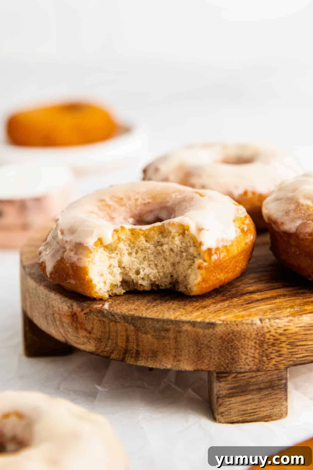 bite out of glazed donuts