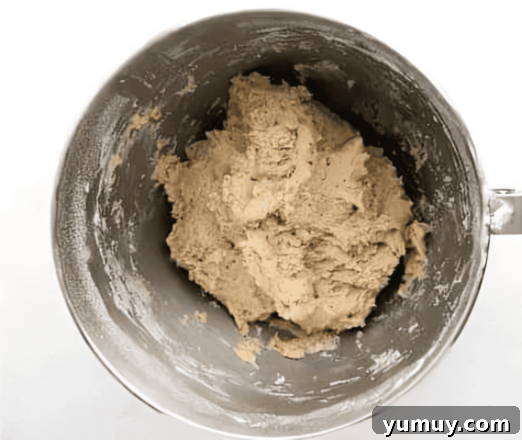 donut dough in a stand mixer bowl.