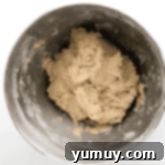 donut dough in a stand mixer bowl.