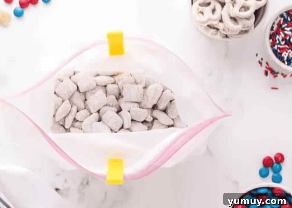 powdered sugar-coated chex mix in a ziplock bag.