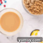 melted white chocolate chips and peanut butter in a glass bowl.