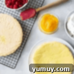 Pan di Spagna 10 Baked sponge cakes, one cooling on a wire rack and another on a cake stand.