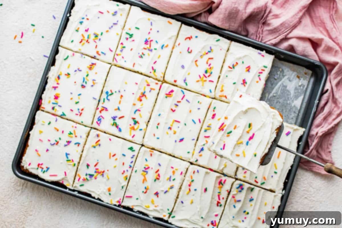 Luscious Vanilla Sheet Cake 16 sliced vanilla sheet cake topped with frosting and sprinkles.