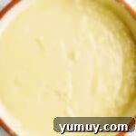 Luscious Vanilla Sheet Cake 6 cake batter in a white bowl.