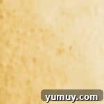 Luscious Vanilla Sheet Cake 7 vanilla sheet cake in a baking pan.