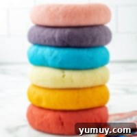 Fun Fragrant Kool Aid Playdough 4 Featured homemade Kool-Aid playdough in a vibrant color, ready for creative play.