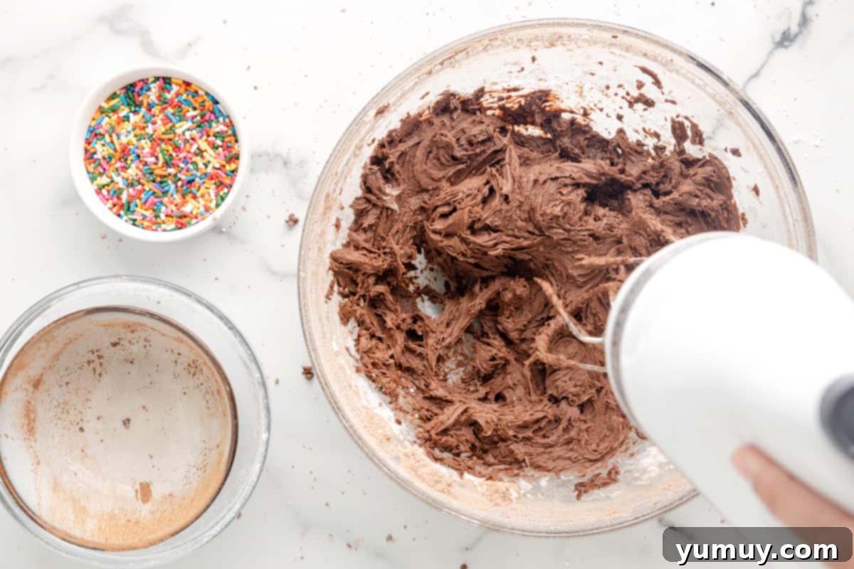 a person mixing ingredients in a bowl.