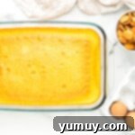yellow cake in a glass baking dish