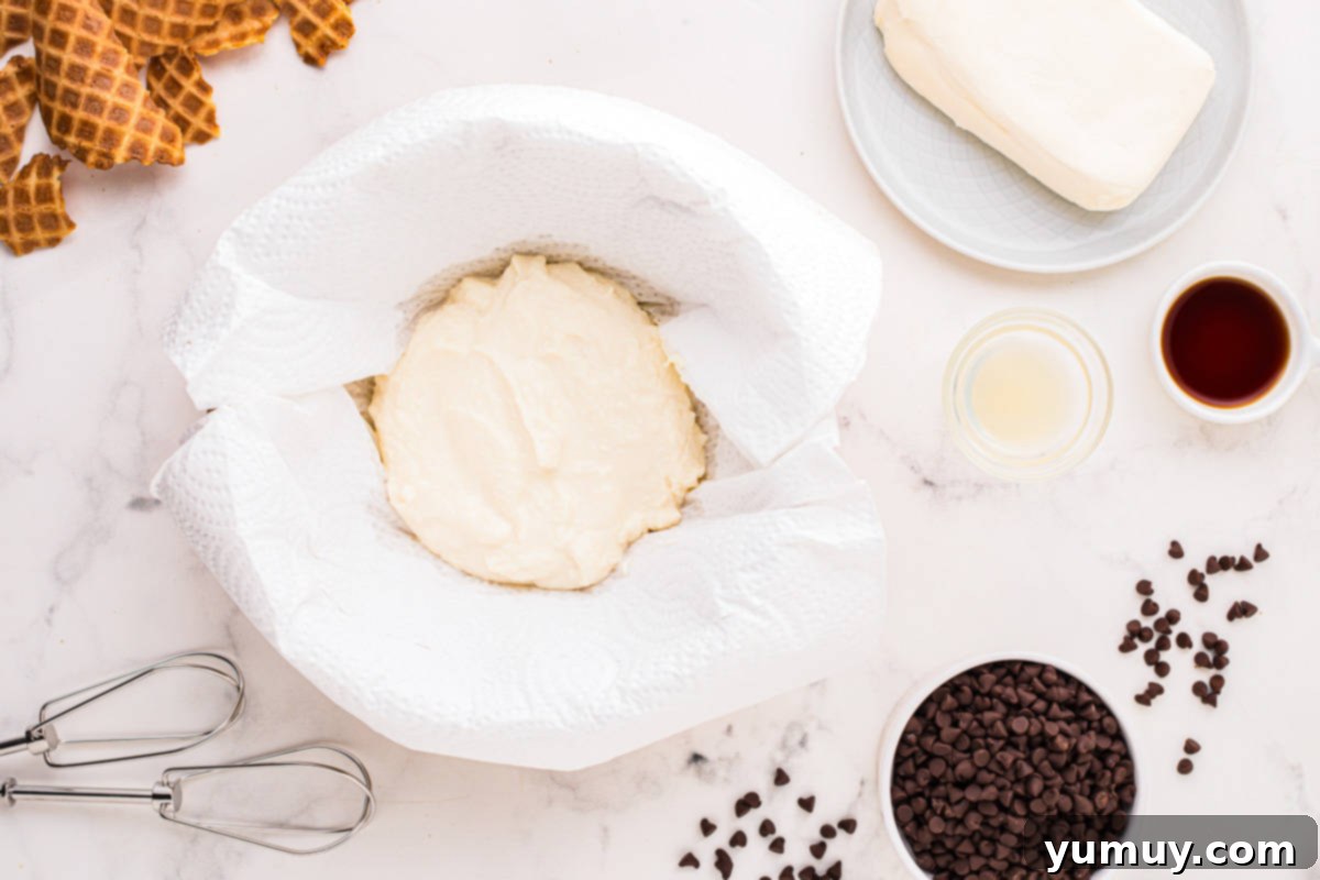Homemade Cannoli Bliss 14 A bowl of chocolate waffles with whipped cream and chocolate chips.