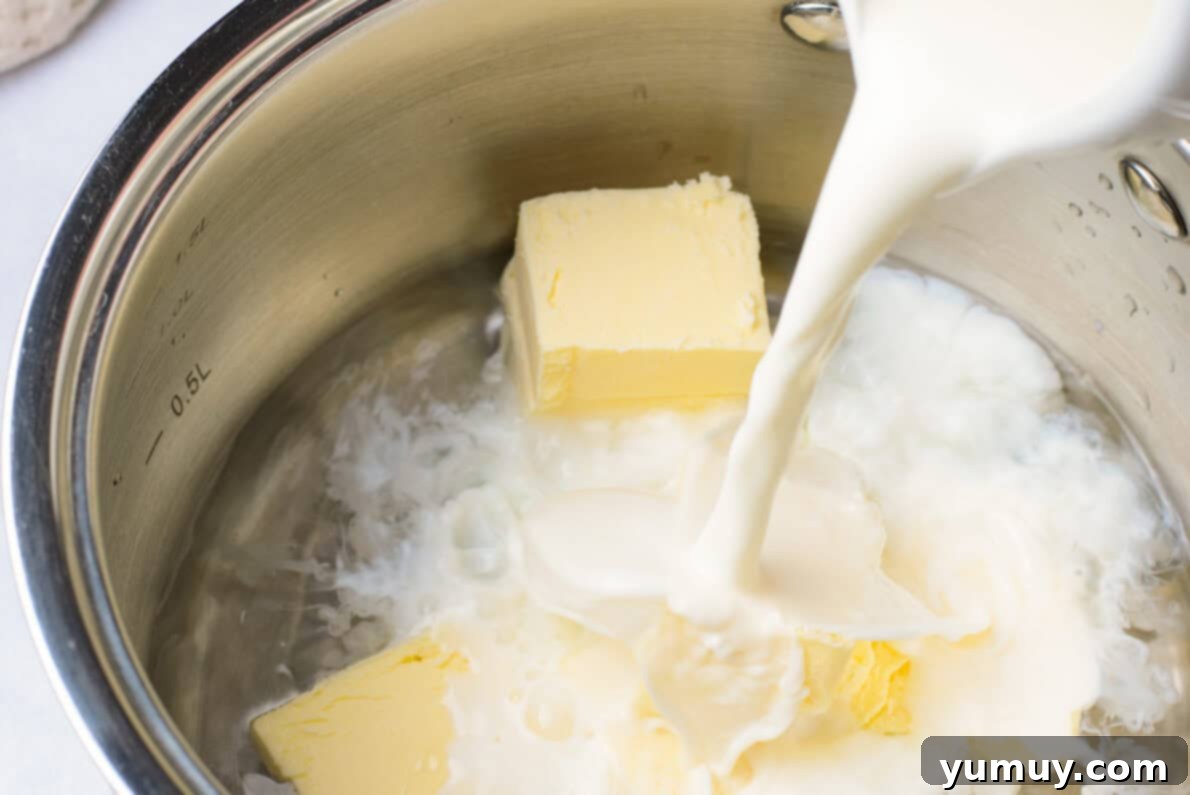 Crispy Chocolate Cruller Twists 14 pouring milk into a metal bowl
