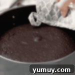 Decadent Chocolate Dream Cake 5 baked chocolate cake in a springform pan.