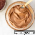 Decadent Chocolate Dream Cake 9 chocolate mousse in a bowl with a spatula