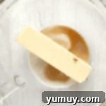 butter, milk, and vanilla in a glass bowl.