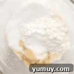flour and sugars in a glass bowl.