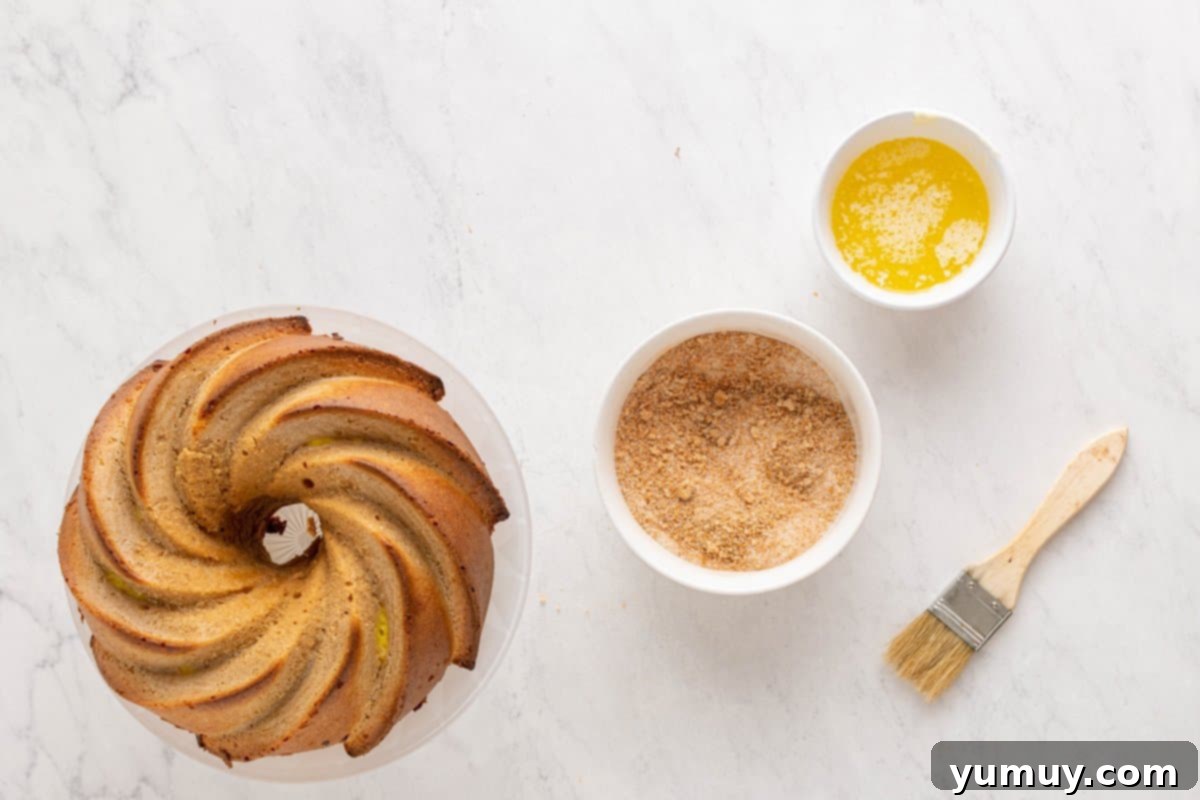 Golden Cinnamon Bundt Cake 32 baked churro bundt cake next to ingredients for churro bunt cake topping.