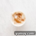 Golden Cinnamon Bundt Cake 10 dry ingredients for churro bundt cake in a white bowl.