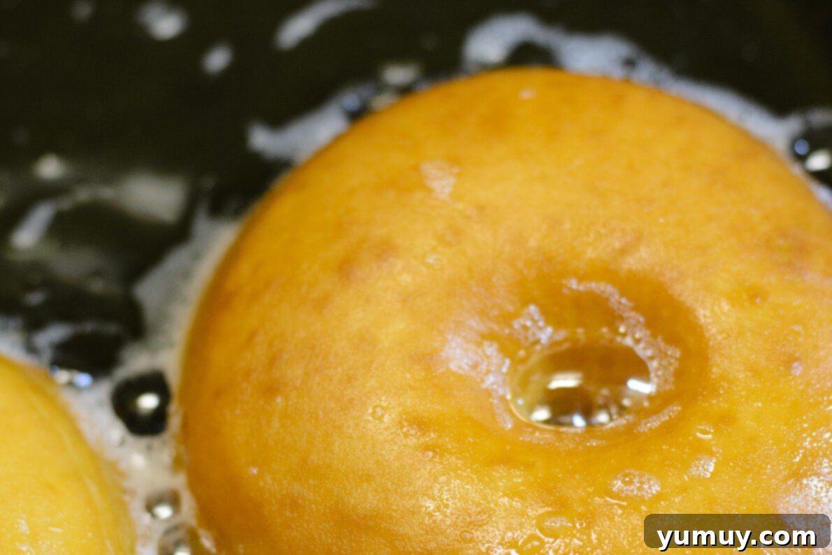 Homemade Krispy Kreme Glazed Donuts 17 frying donuts