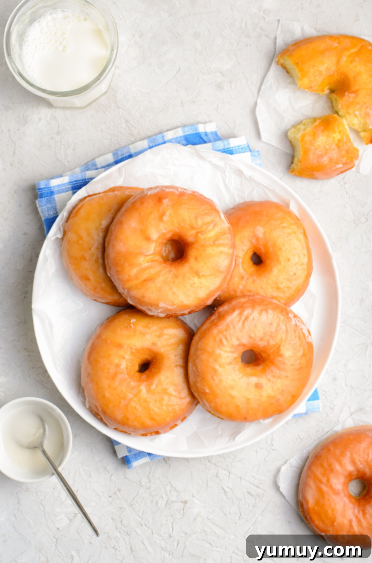 Homemade Krispy Kreme Glazed Donuts 3 a plate of Krispy Kreme glazed donuts