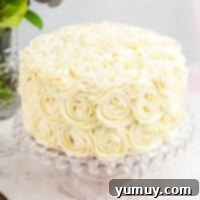 Featured easy homemade wedding cake with delicate rosettes.