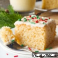 Featured eggnog sheet cake, beautifully frosted and ready to serve, a perfect holiday treat.