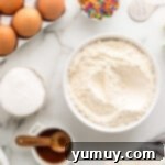 Bowl containing whisked dry ingredients for funfetti pound cake.