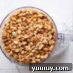 Craft Your Own Peanut Butter 5 Peanuts in a food processor, beginning the transformation into butter.