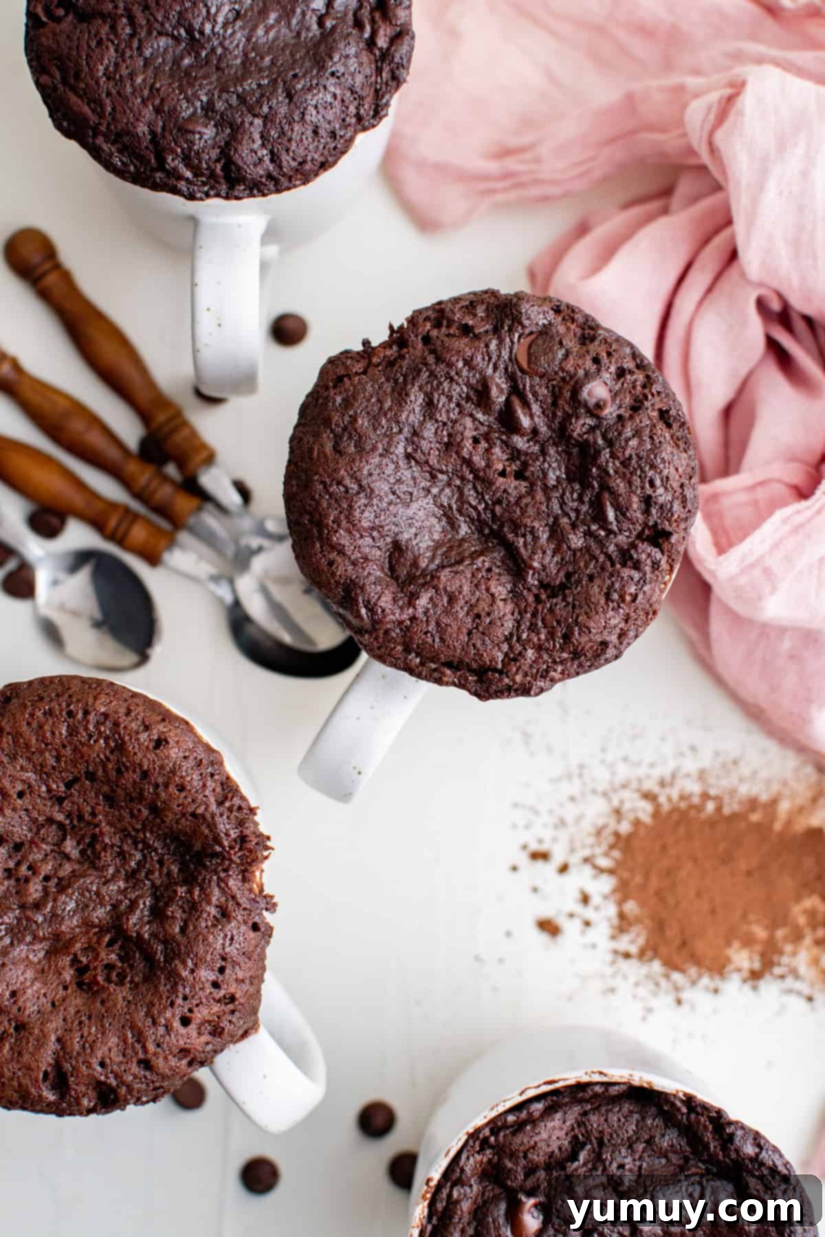 overhead view of microwave brownies in mugs