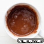 brownie batter in a mug, before microwaving