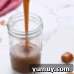 Freshly made brown sugar caramel sauce in a heat-proof container, cooling.