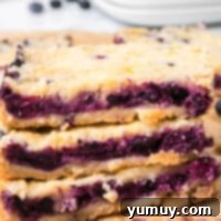 Blueberry Bliss Bars 4 stacked blueberry pie bars