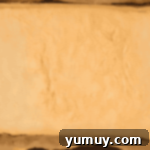 Blueberry Bliss Bars 6 baked sugar cookie dough in a baking pan.