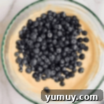 Blueberry Bliss Bars 7 blueberry cream cheese filling in a glass bowl.