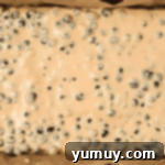 Blueberry Bliss Bars 8 blueberry filling in a baking pan.