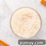 rinsed uncooked arborio rice in a glass bowl.