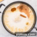 milk, cream, and spices in a saucepan.