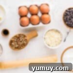 German Chocolate Coconut Pecan Delight Pie 5 Measured ingredients for German chocolate pie in individual bowls.