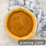 Vinegar Pie A Slice of Humble Pie: The Unexpected Delight 7 Vinegar pie filling poured into a baked pie crust.