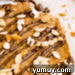 Crafting Your Perfect Protein Bars 7 no bake protein bars mixture formed into a large square, before slicing