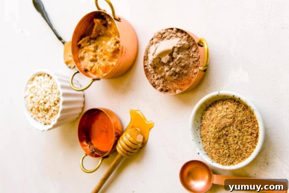 Crafting Your Perfect Protein Bars 8 measured ingredients for homemade protein bars in individual bowls.