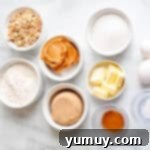 Various baking ingredients laid out in bowls, ready for mixing