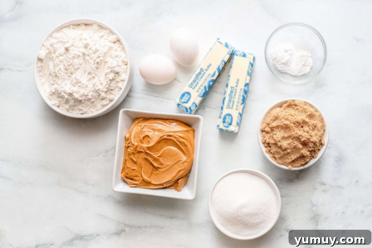 Ingredients for peanut butter cookies: flour, sugar, butter, eggs, peanut butter, and brown sugar.