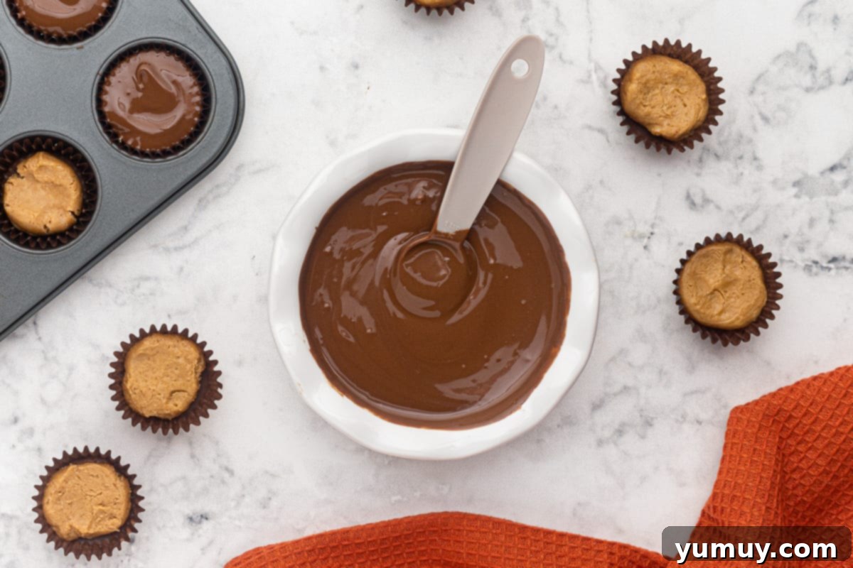 Step 2: Smooth, melted chocolate in a bowl, ready for the first layer.