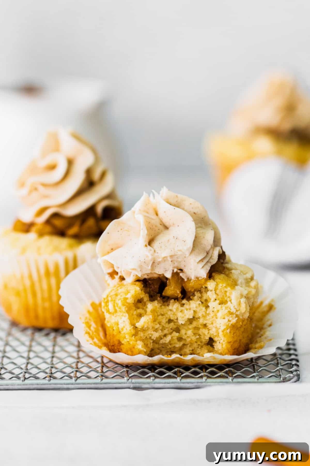 Golden Apple Crumb Cupcakes 3 bite out of apple pie cupcake