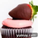chocolate covered strawberry cupcakes on cake stand